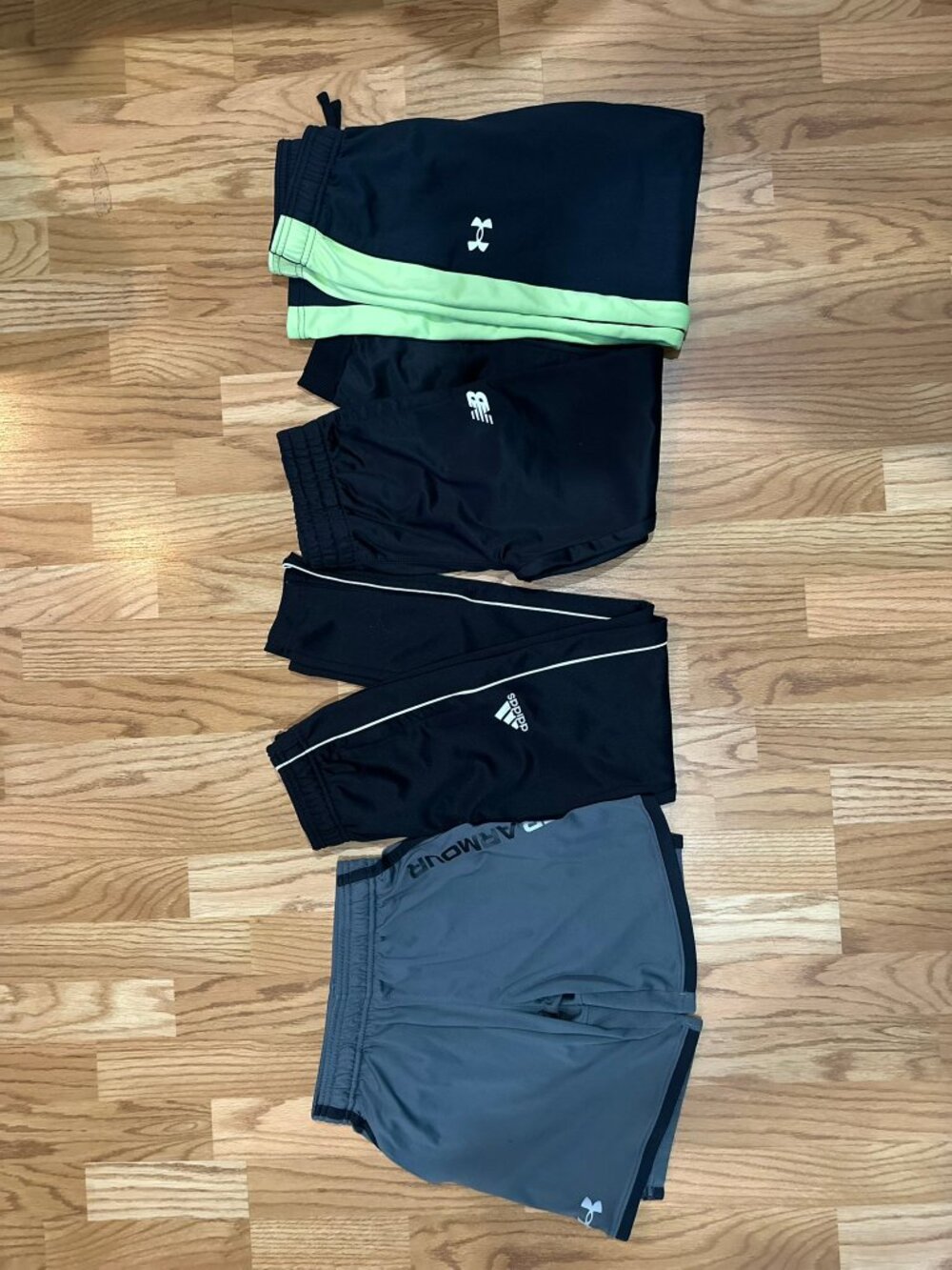 Lot of Adidas, New Balance and Under Armour kids pants and shorts